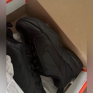 BLACK NIKES.  NEVER WORN